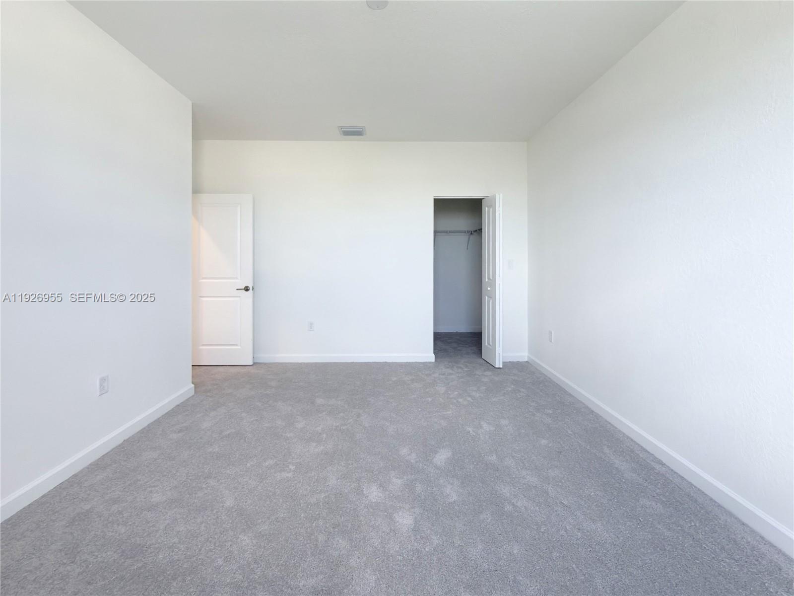 13202 Southwest 189th Terrace Miami, FL 33157 - Photo 17 of 34 a view of an empty room