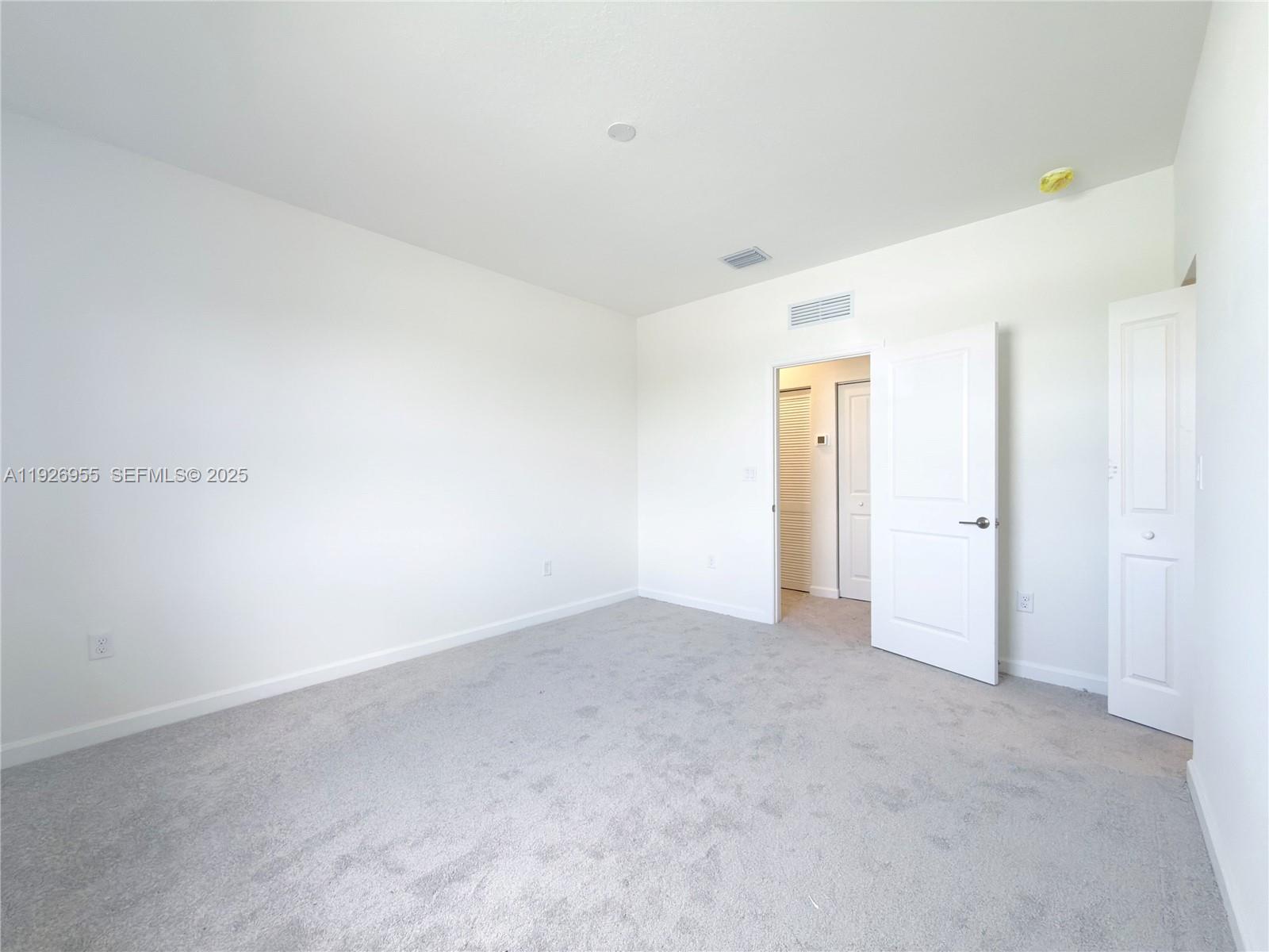 13202 Southwest 189th Terrace Miami, FL 33157 - Photo 23 of 34 a view of an empty room