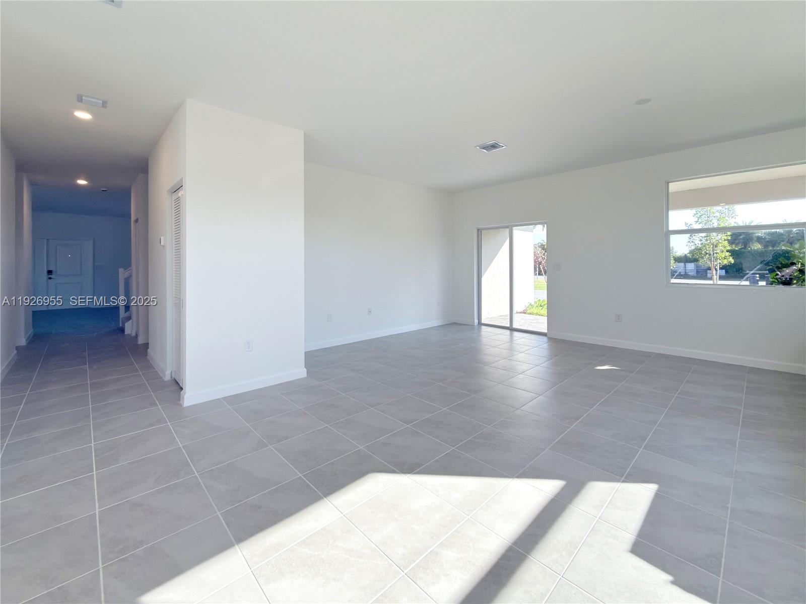 13202 Southwest 189th Terrace Miami, FL 33157 - Photo 32 of 34 a view of an empty room and window