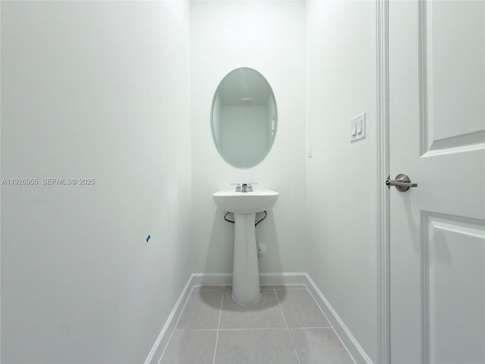 13202 Southwest 189th Terrace Miami, FL 33157 - Photo 10 of 34 a bathroom with a sink