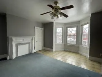 a view of empty room with closet