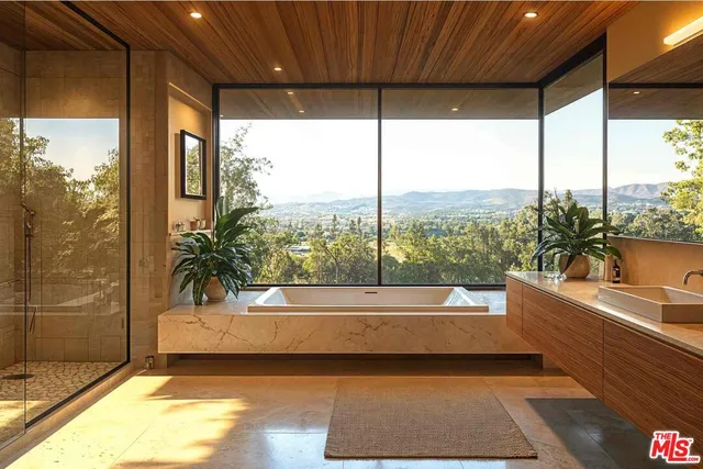 a bathroom with a bathtub and a shower