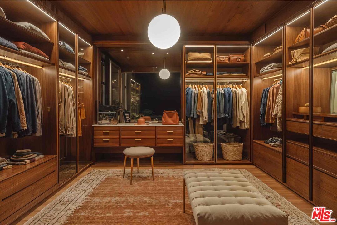 7305 Pyramid Place Los Angeles, CA 90046 - Photo 20 of 36 a room with lots of wooden furniture and a shower