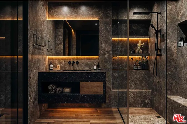 a bathroom with a sink and a mirror