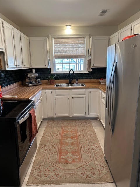 202 Mayfair Road Nashville, TN 37205 - Photo 12 of 21 a kitchen with granite countertop a sink stove and refrigerator