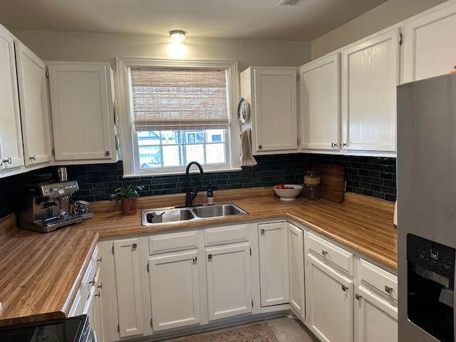 202 Mayfair Road Nashville, TN 37205 - Photo 14 of 21 a kitchen with stainless steel appliances granite countertop a sink a stove a refrigerator and cabinets