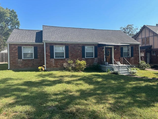 202 Mayfair Road Nashville, TN 37205 - Photo 2 of 21 a front view of a house with a garden