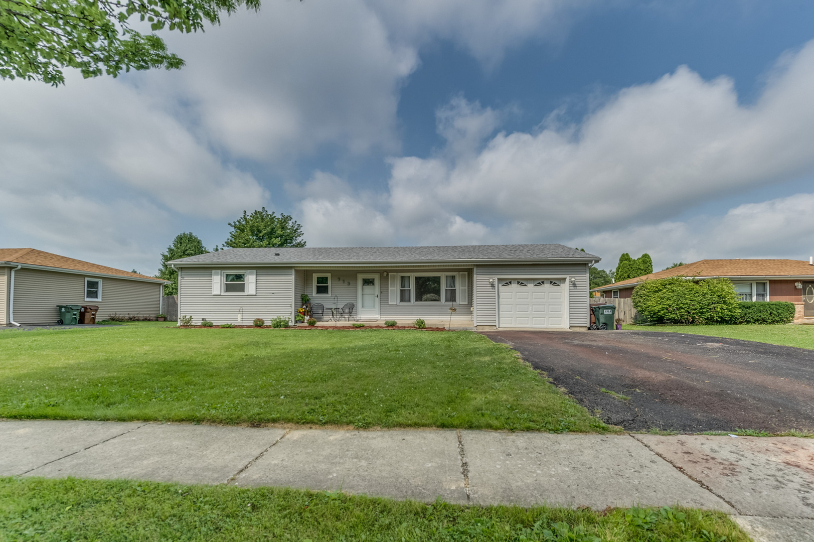 713 South Cooper Road New Lenox, IL 60451 - Photo 1 of 21 a front view of house with yard and green space