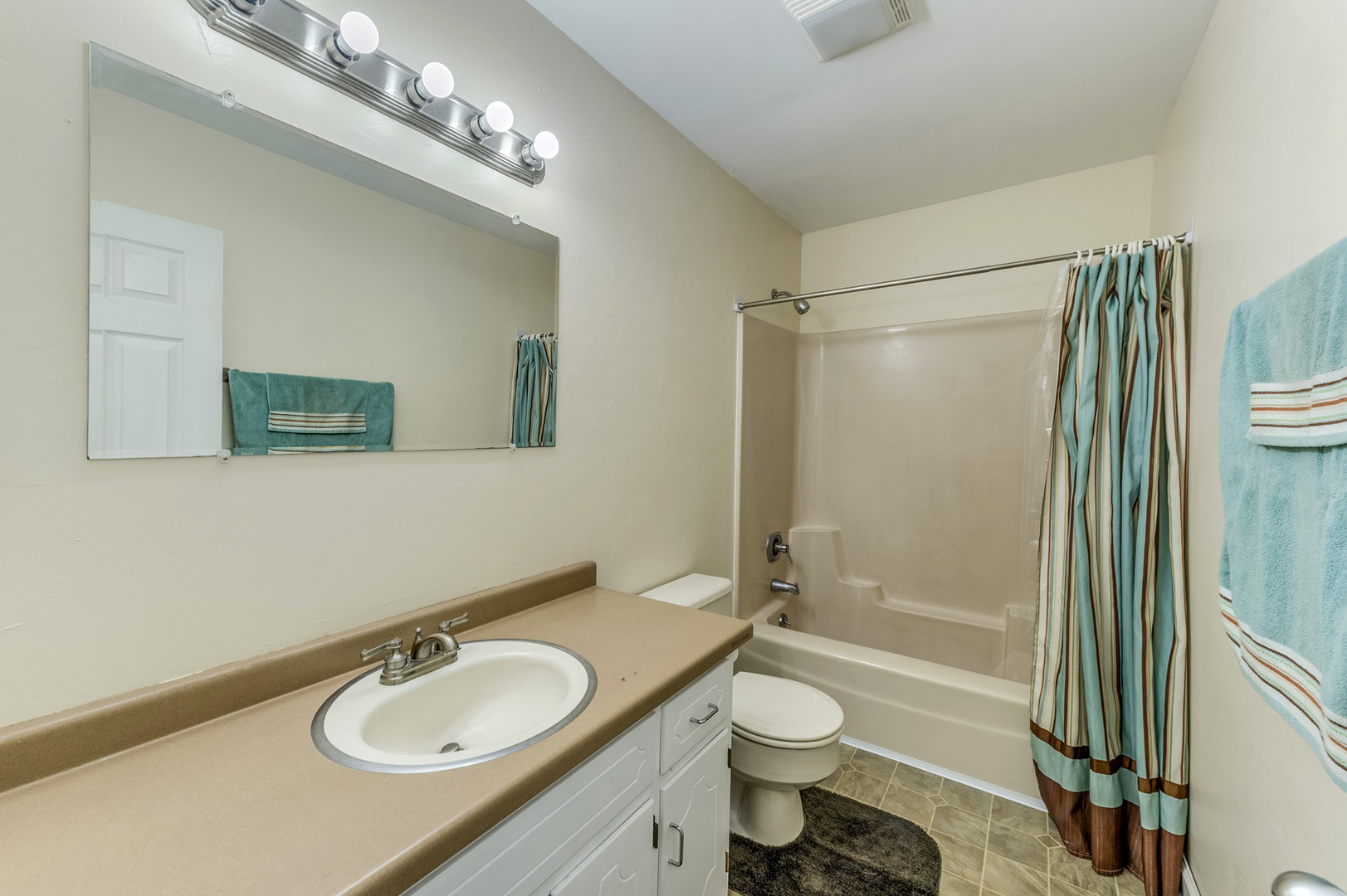 713 South Cooper Road New Lenox, IL 60451 - Photo 13 of 21 a bathroom with a granite countertop sink toilet a shower and mirror