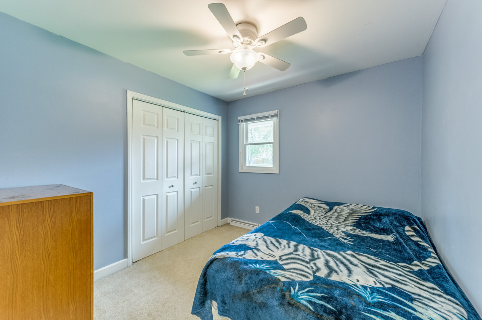 713 South Cooper Road New Lenox, IL 60451 - Photo 17 of 21 a bedroom with a bed and a chandelier
