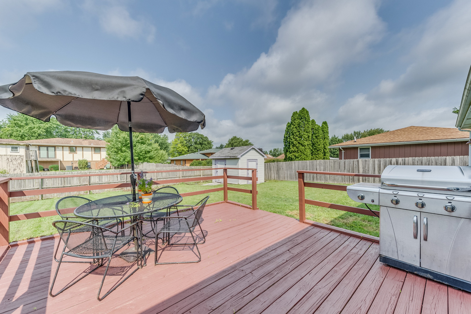 713 South Cooper Road New Lenox, IL 60451 - Photo 20 of 21 a view of a chairs and table in the patio with a fire pit