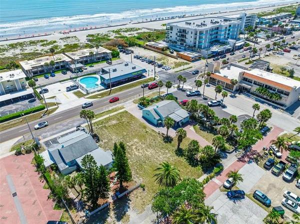 an aerial view of a houses with outdoor space