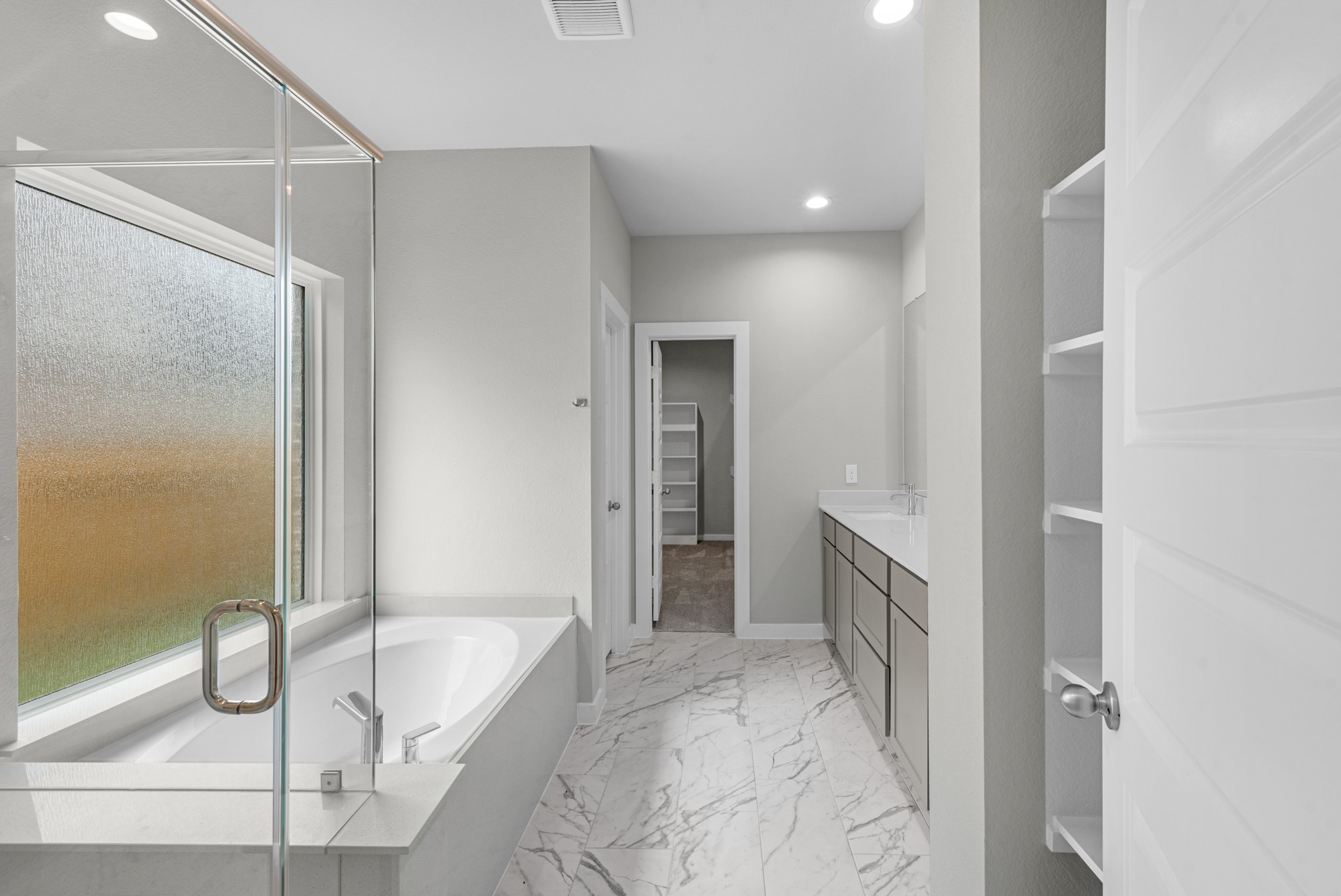 3107 Spitfire Drive Rosenberg, TX 77471 - Photo 11 of 39 a bathroom with a tub shower and sink