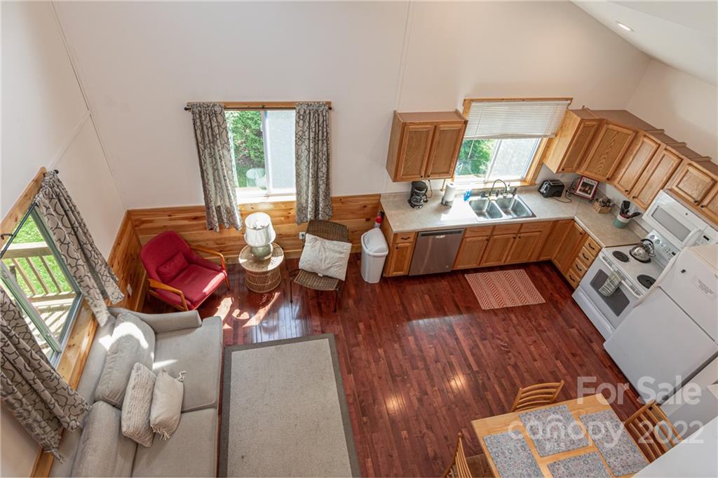 29 Davidson Road Asheville, NC 28803 - Photo 17 of 37 a living room with furniture and wooden floor