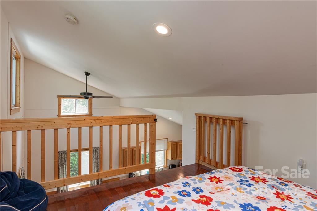 29 Davidson Road Asheville, NC 28803 - Photo 19 of 37 a bedroom with furniture and window