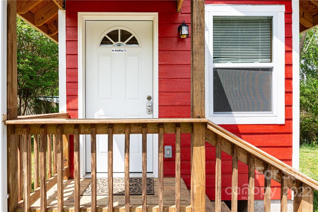 29 Davidson Road Asheville, NC 28803 - Photo 27 of 37 a front view of a house with a balcony