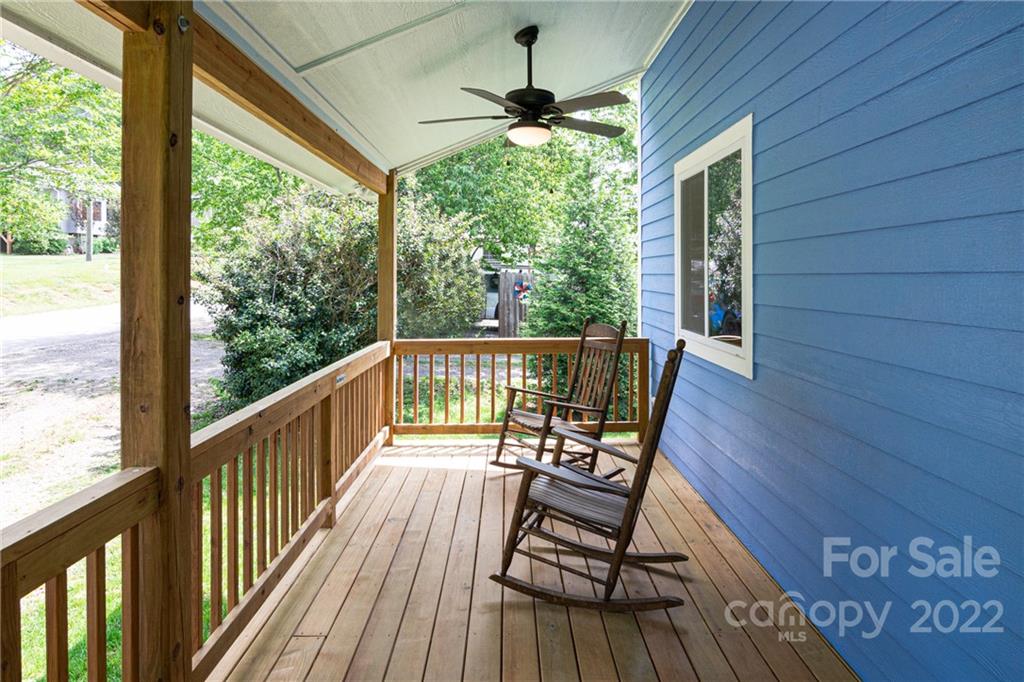 29 Davidson Road Asheville, NC 28803 - Photo 4 of 37 a view of two chairs in the balcony