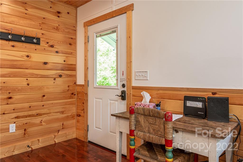 29 Davidson Road Asheville, NC 28803 - Photo 6 of 37 a bedroom with a bed and furniture