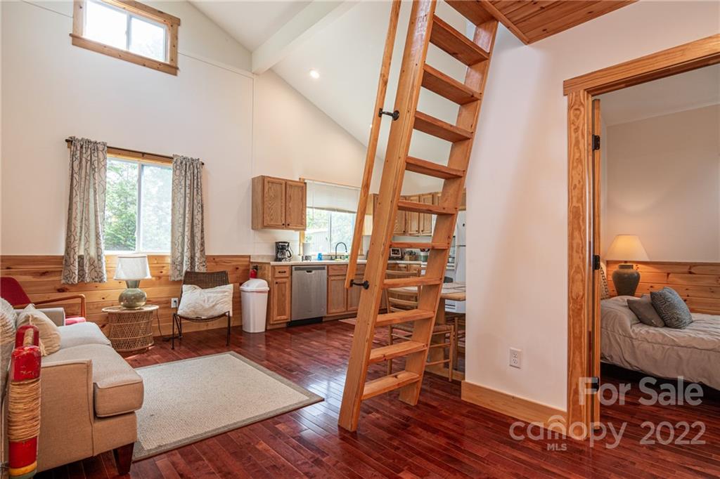 29 Davidson Road Asheville, NC 28803 - Photo 7 of 37 a living room with furniture and wooden floor