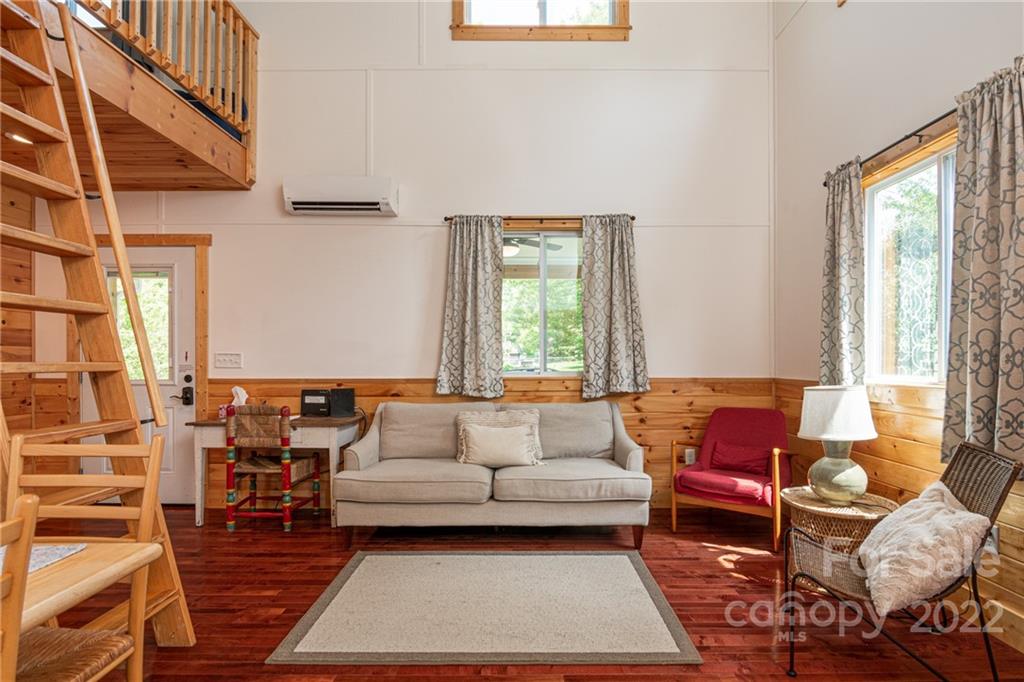 29 Davidson Road Asheville, NC 28803 - Photo 9 of 37 a living room with furniture and a window