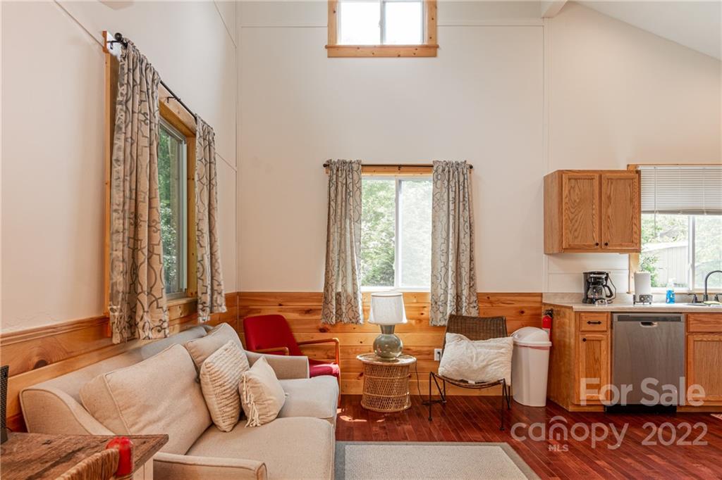 29 Davidson Road Asheville, NC 28803 - Photo 10 of 37 a living room with furniture and large windows