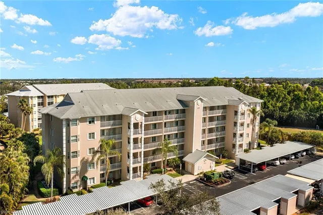 a view of a swimming pool with an outdoor seating