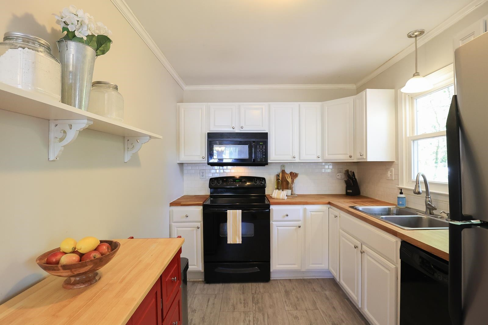 5400 McCormick Road Durham, NC 27713 - Photo 7 of 26 White cabinets are stylish.