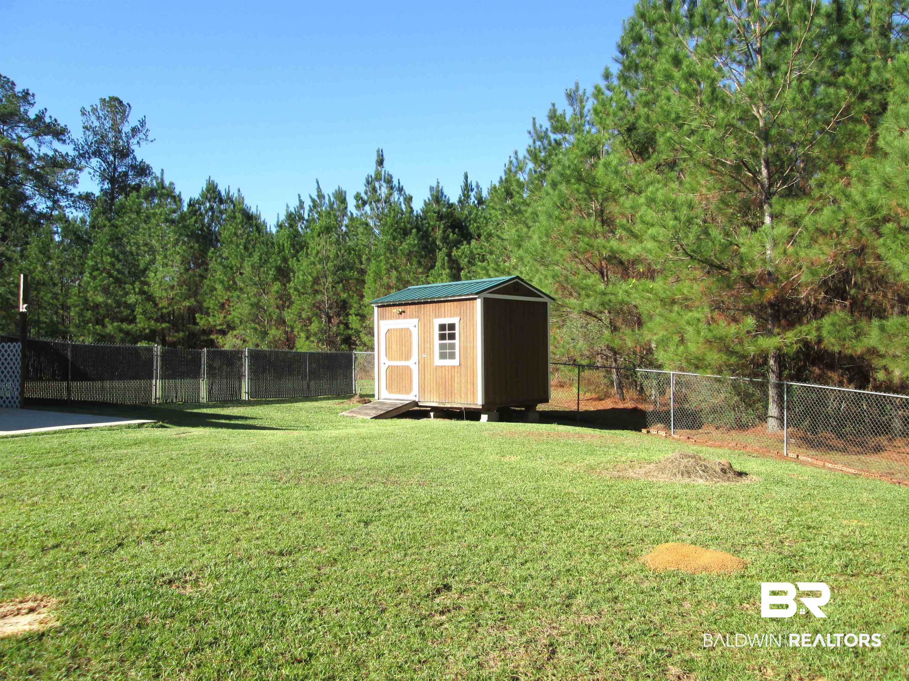 530 Brethren Church Road Fruitdale, AL 36539 - Photo 14 of 24 View of yard featuring a storage shed