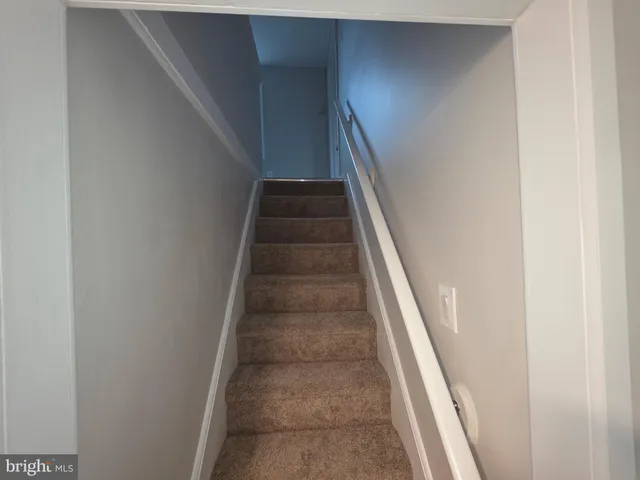 a bathroom with a bathtub and toilet