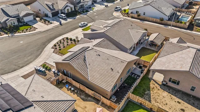 an aerial view of a multi story parking space