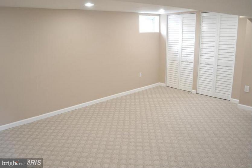 6022 Brunswick Street Springfield, VA 22150 - Photo 17 of 24 a view of an empty room with a window