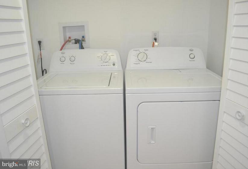 6022 Brunswick Street Springfield, VA 22150 - Photo 24 of 24 a utility room with dryer and washer