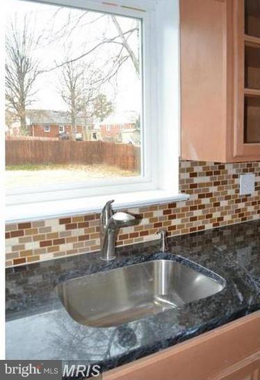 6022 Brunswick Street Springfield, VA 22150 - Photo 9 of 24 a view of a sink and a window