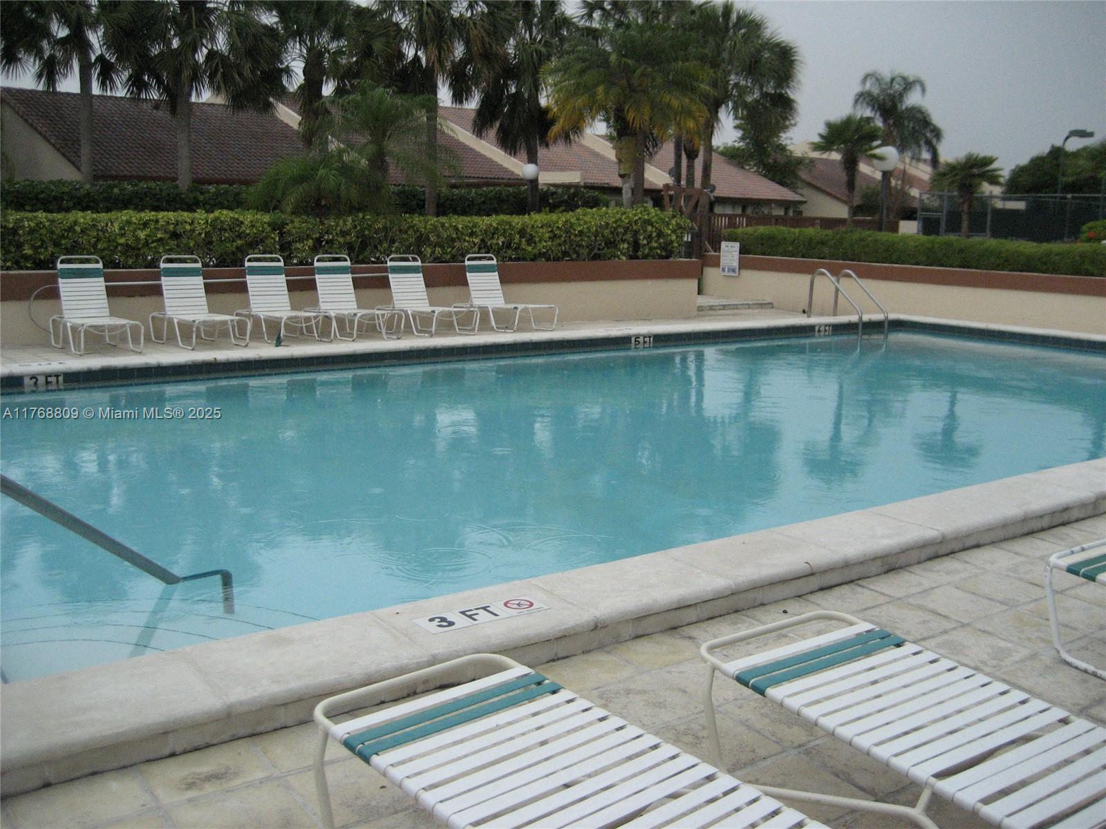 8589 Southwest 115th Place Miami, FL 33173 - Photo 10 of 13 a view of a lake view