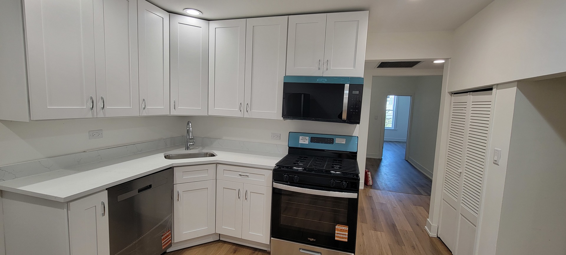 3207 North Wilton Avenue, Unit 2 Chicago, IL 60657 - Photo 9 of 14 a kitchen with a sink stove and cabinets