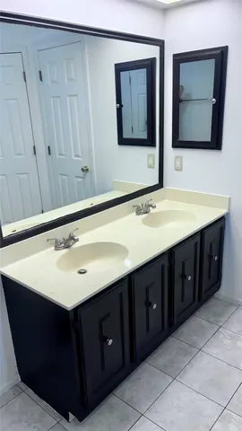 a view of room with wooden floor