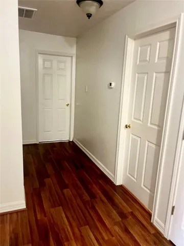 a view of house with backyard and garden