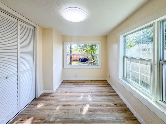a view of an empty room and window