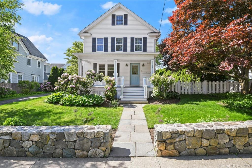 35 Catoonah Street Ridgefield, CT 06877 - Photo 1 of 1 a front view of a house with a yard