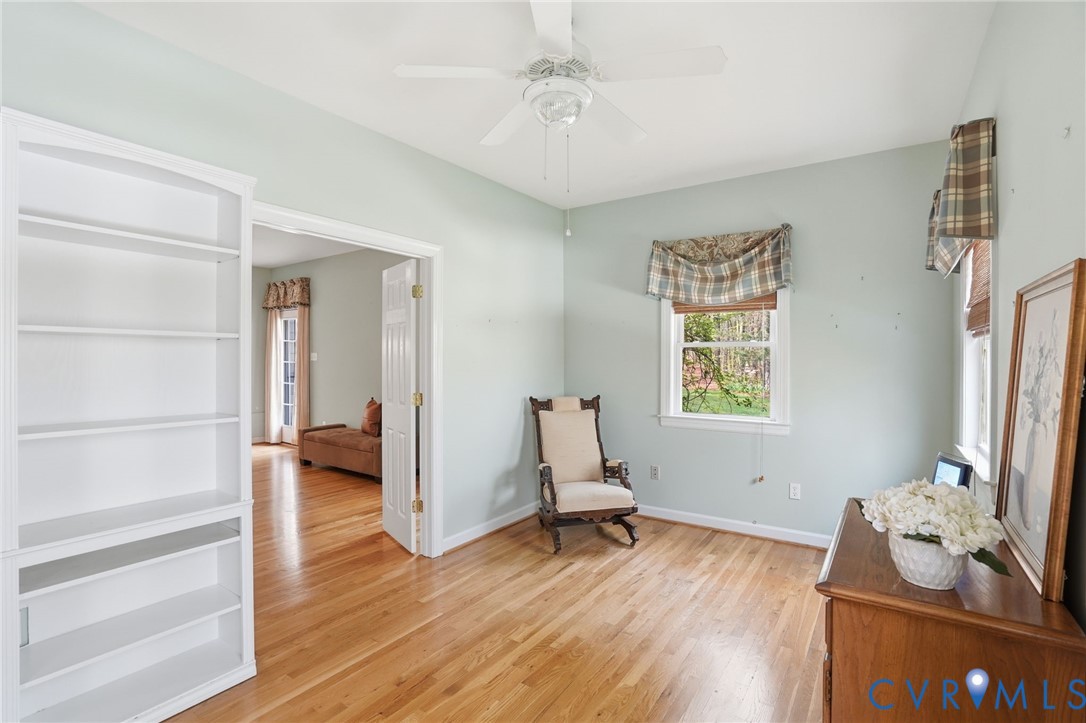 14430 Overlook Ridge Lane Beaverdam, VA 23015 - Photo 35 of 71 a living room with furniture and a window