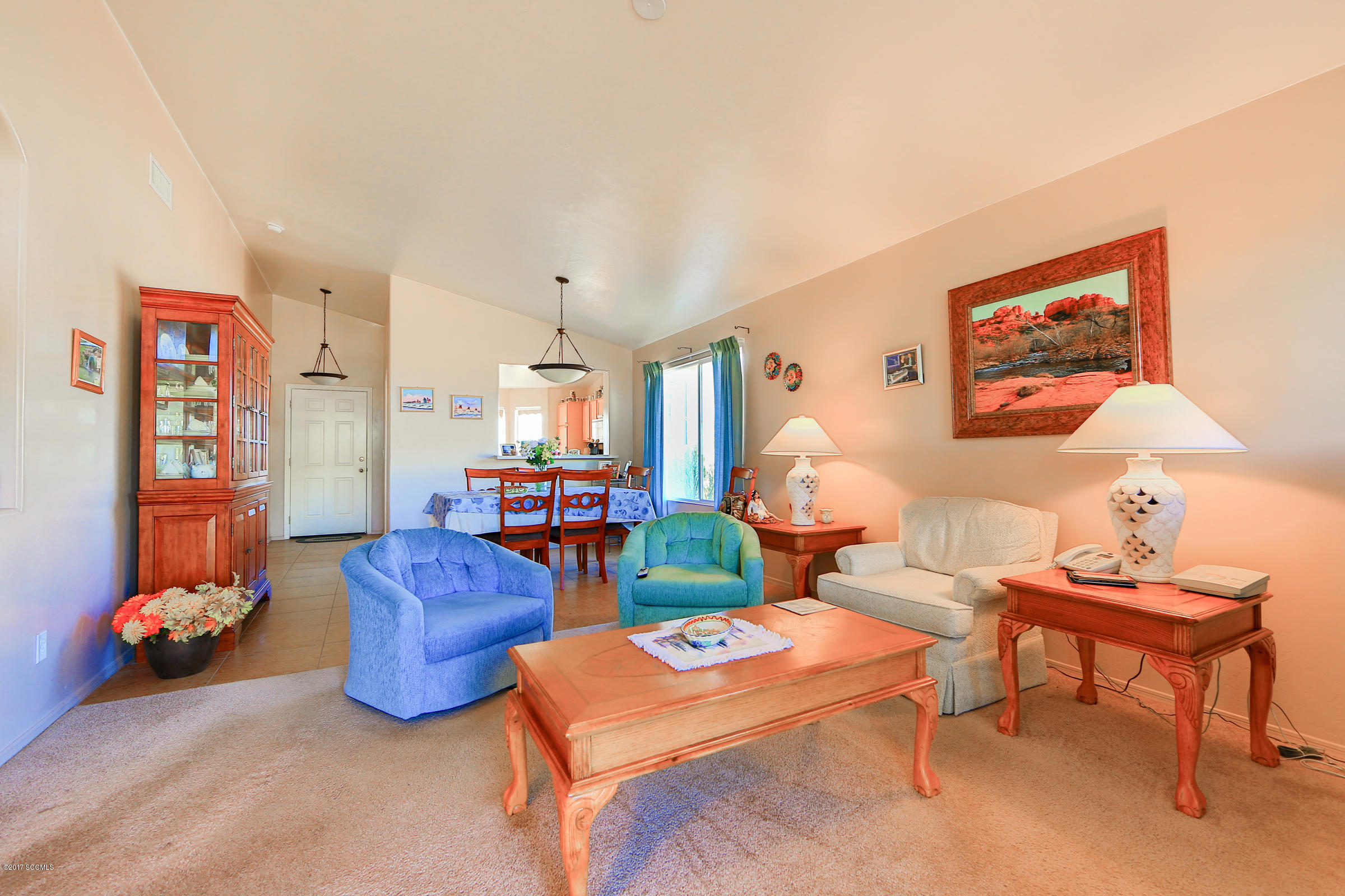 162 Utah Court Rio Rico, AZ 85648 - Photo 6 of 21 a living room with furniture and a baby crib
