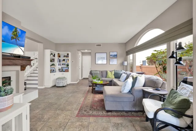 a bathroom with a double vanity sink and mirror