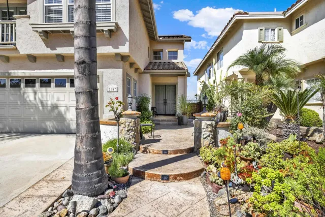 a dining room with furniture and a fireplace