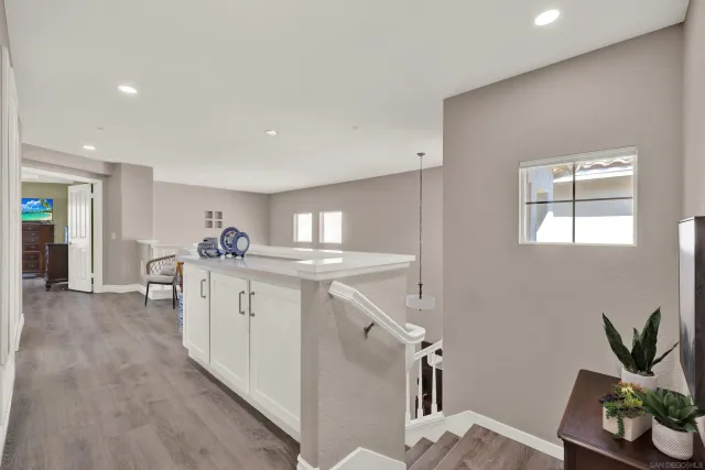 a bathroom with a tub a sink and a shower
