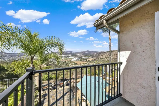a view of living room with furniture and wooden floor