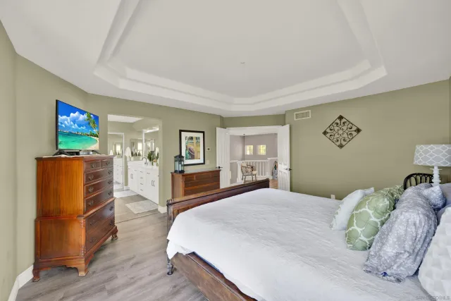 a view of a livingroom with workspace and a window