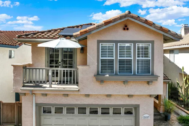 a view of a chairs and table in a patio