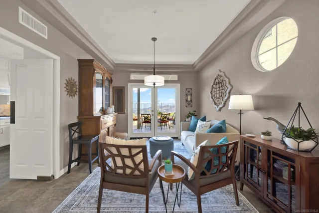 a kitchen with white cabinets and appliances