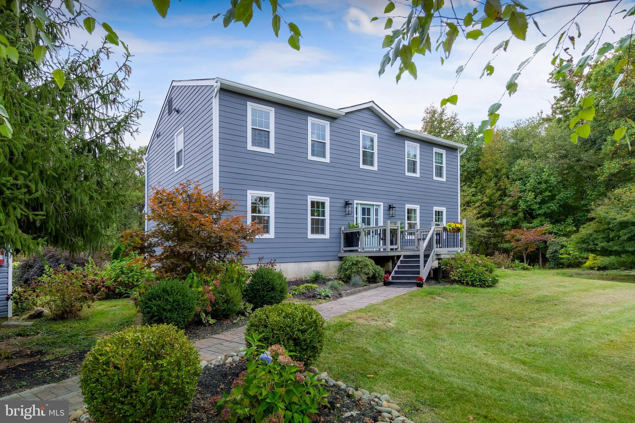 141 West Tomlin Station Road Mickleton, NJ 08056 - Photo 1 of 33 a front view of a house with garden
