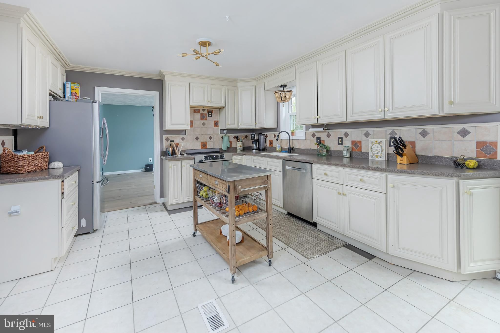 141 West Tomlin Station Road Mickleton, NJ 08056 - Photo 10 of 33 a kitchen with a sink a stove and cabinets